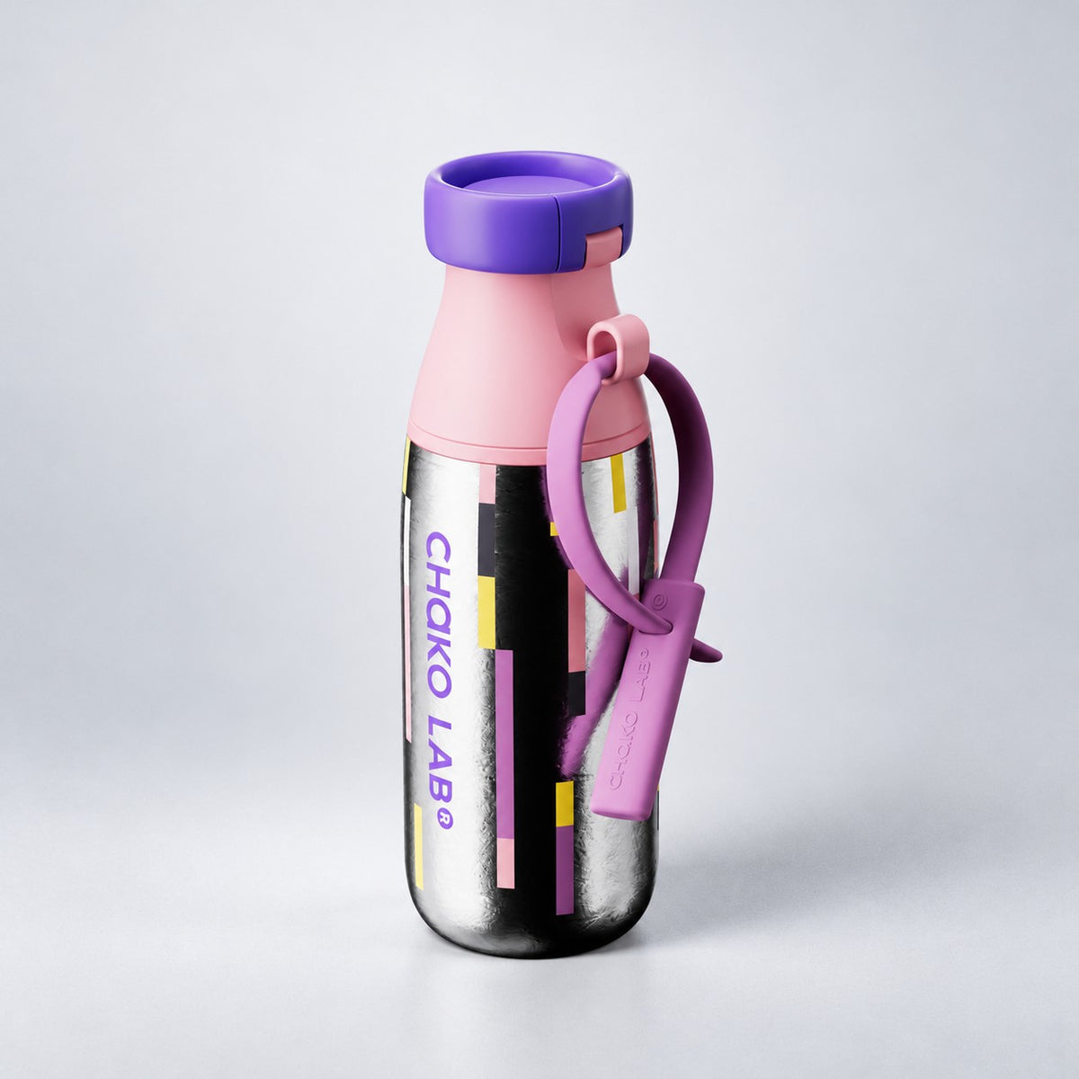 Chakolab MILKPOD Ti Stardust water bottle with a sleek titanium design and iridescent Stardust finish, featuring a secure lid and modern look.